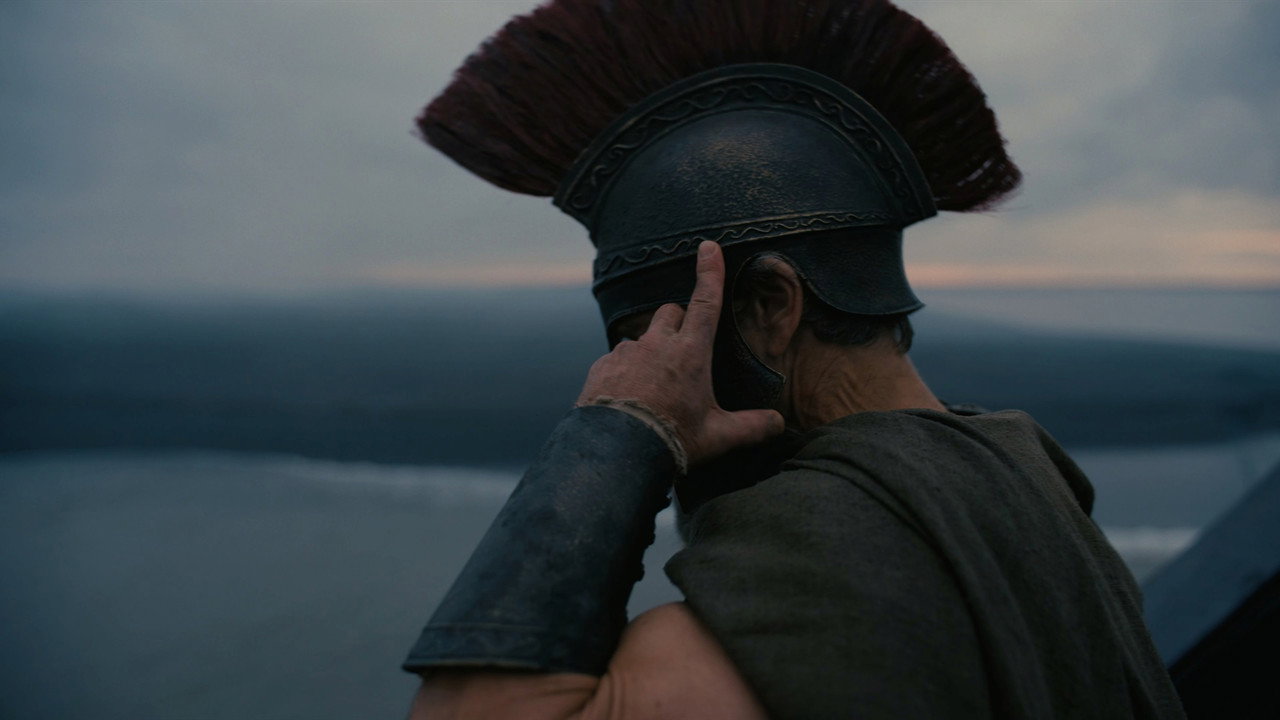 A warrior facing a grey sea in Christopher Nolan's The Odyssey
